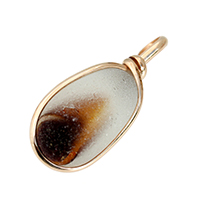 Amber sea glass pontil piece set in gold bezel