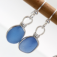Bright blue sea glass earrings in silver